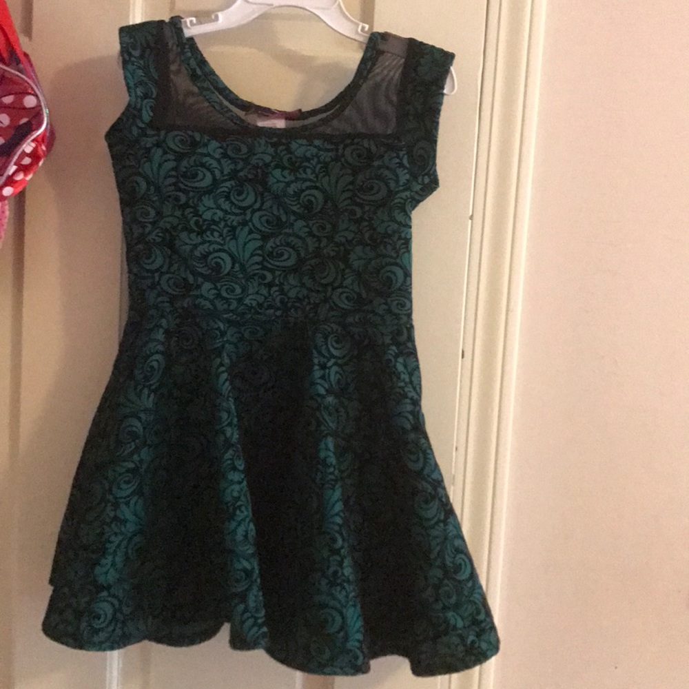 Green and black skater dress with mesh detail